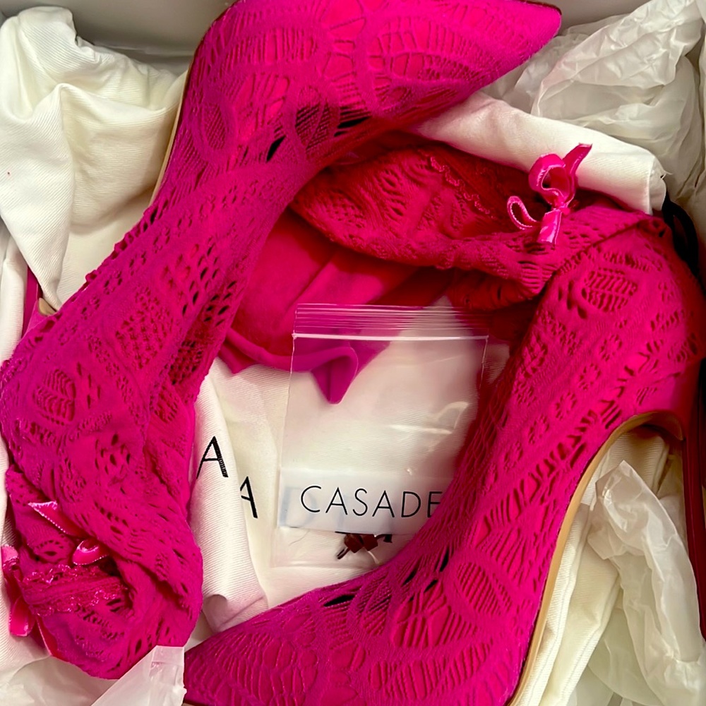Pink sock boot with bows on the back. Size 40 runs small. Brand new with box